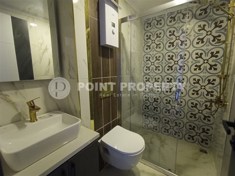 Небольшая новая квартира с собственным садом, в современном районе Аланьи - Махмутлар-id-6604-фото-7