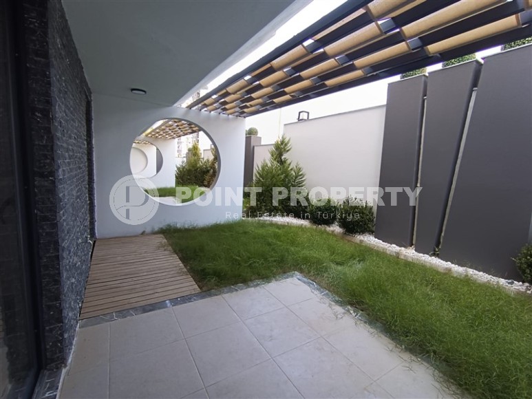 Небольшая новая квартира с собственным садом, в современном районе Аланьи - Махмутлар-id-6604-фото-8