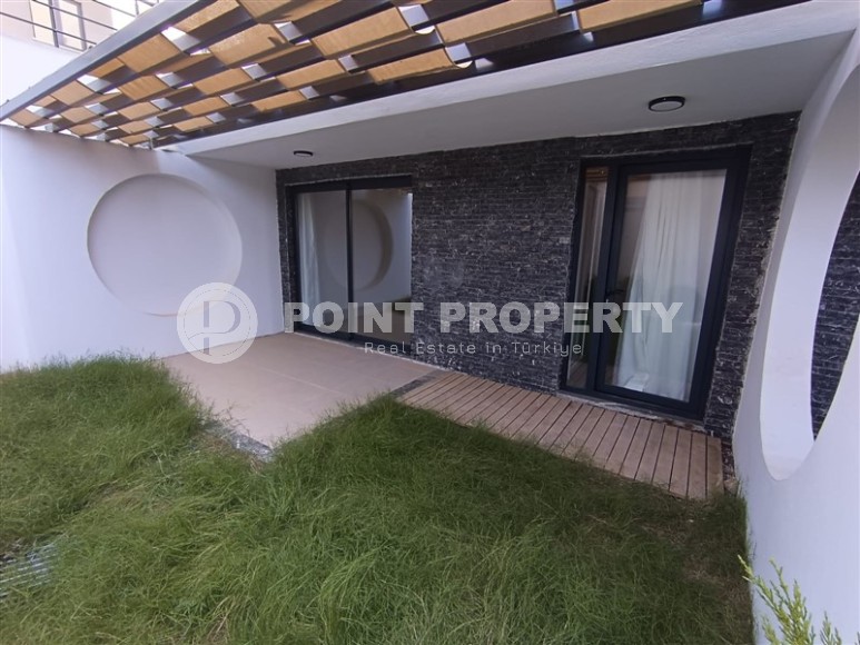 Небольшая новая квартира с собственным садом, в современном районе Аланьи - Махмутлар-id-6604-фото-9