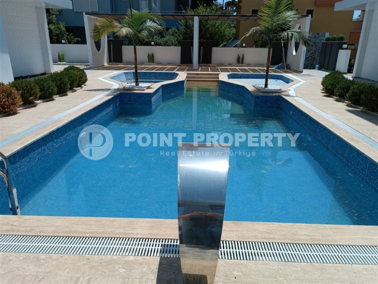 Небольшая новая квартира с собственным садом, в современном районе Аланьи - Махмутлар-id-6604-фото-11