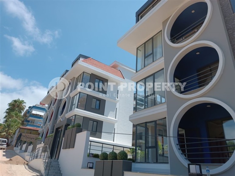 Небольшая новая квартира с собственным садом, в современном районе Аланьи - Махмутлар-id-6604-фото-13