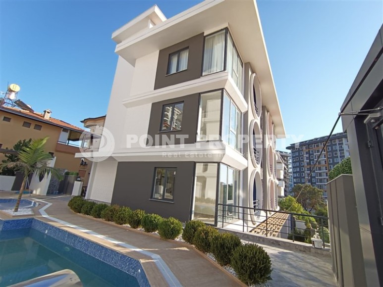 Небольшая новая квартира с собственным садом, в современном районе Аланьи - Махмутлар-id-6604-фото-14