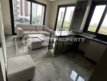 Стильная, новая квартира в доме 2023 года постройки, в популярном курортном районе Мерсина - Тедже-id-6613-фото-1