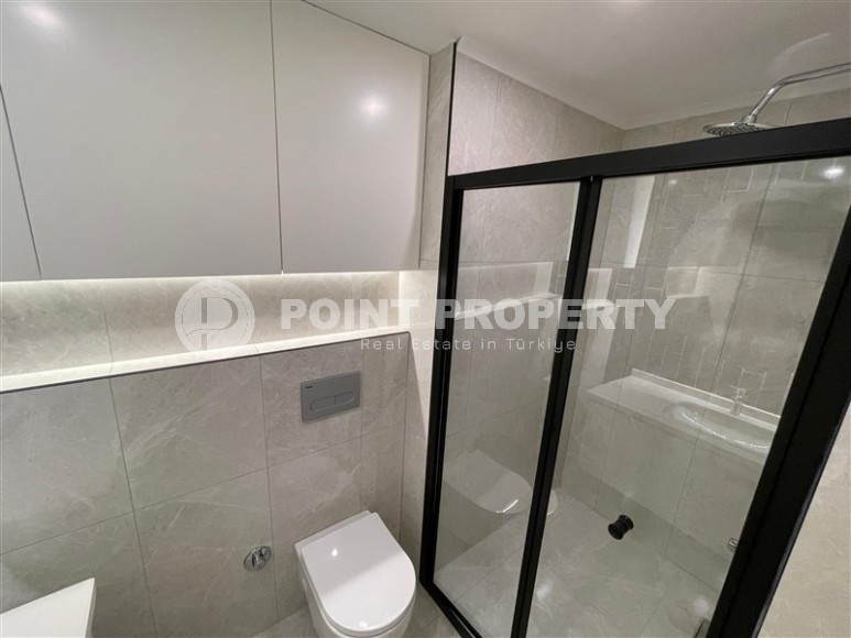 Stylish apartment with modern design, in a new residential complex, in the center of Alanya-id-6619-photo-10