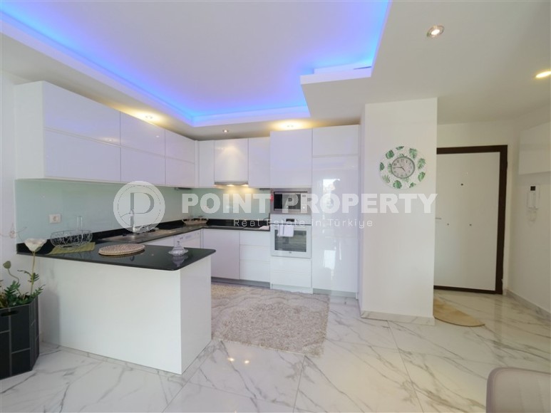 Современная квартира с просторной открытой террасой, на 1-м этаже в комфортабельном жилом комплексе, с богатой внутренней инфраструктурой-id-6628-фото-4