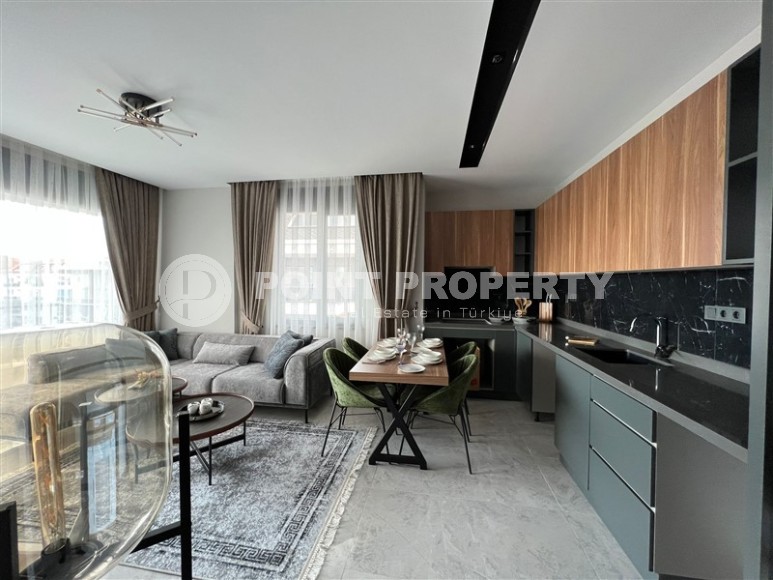 Комфортабельная квартира с видом на море, на 4-м этаже в современном жилом комплексе, в центре престижного района Аланьи - Кестель-id-6631-фото-2