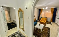 Small apartment with an excellent location 50 meters from the sea, in the center of the popular area of Alanya - Mahmutlar-id-6632-photo-8
