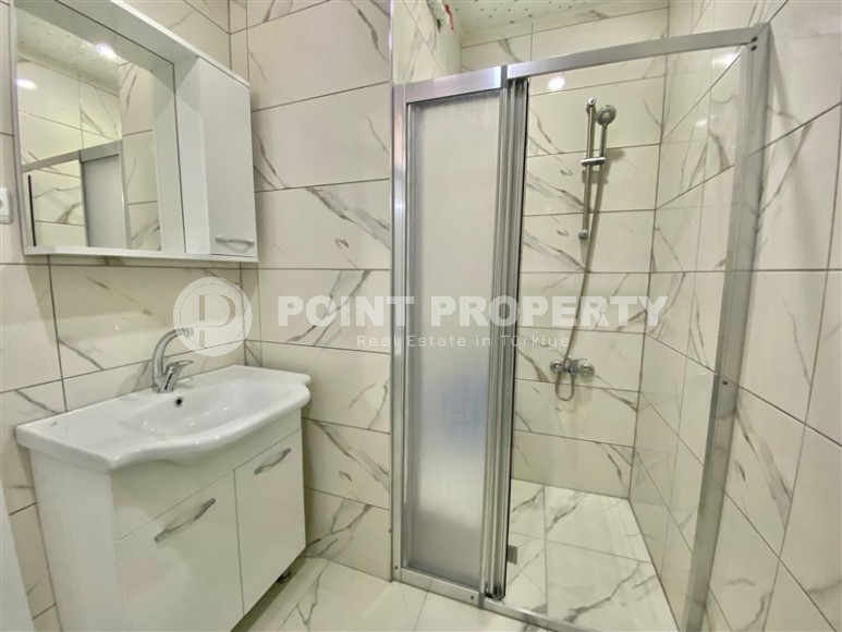 Small apartment with an excellent location 50 meters from the sea, in the center of the popular area of Alanya - Mahmutlar-id-6632-photo-11