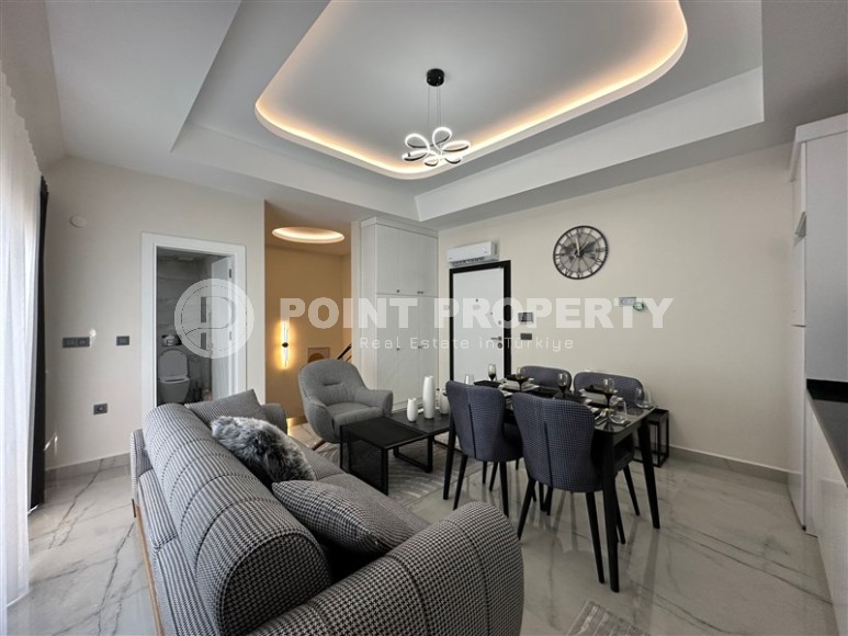 Панорамный дуплекс с видом на море, в новом жилом комплексе, в центре района Махмутлар-id-6634-фото-3