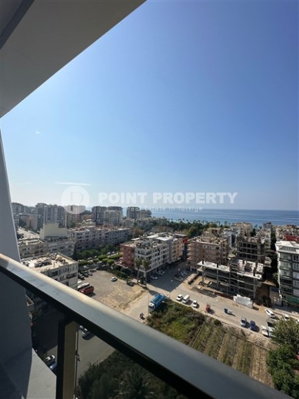 Панорамный дуплекс с видом на море, в новом жилом комплексе, в центре района Махмутлар-id-6634-фото-12