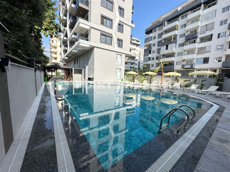 Панорамный дуплекс с видом на море, в новом жилом комплексе, в центре района Махмутлар-id-6634-фото-18