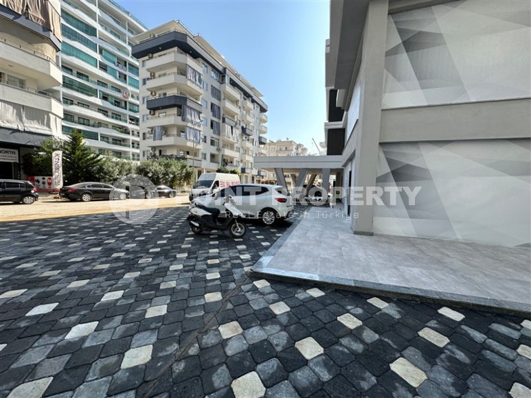 Панорамный дуплекс с видом на море, в новом жилом комплексе, в центре района Махмутлар-id-6634-фото-21