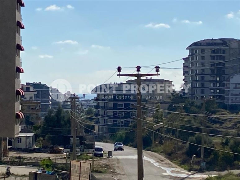 Квартира в строящемся жилом комплексе, в 1200 метрах от моря, в районе Авсаллар-id-6635-фото-9