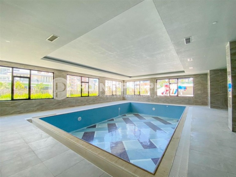 Modern, comfortable apartment 1+1, with mountain views, on the 10th floor, in a residential complex built in 2021-id-6640-photo-13