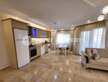 Apartment with an excellent location 100 meters from the sea, in the center of the modern area of Alanya - Mahmutlar-id-6643-photo-3