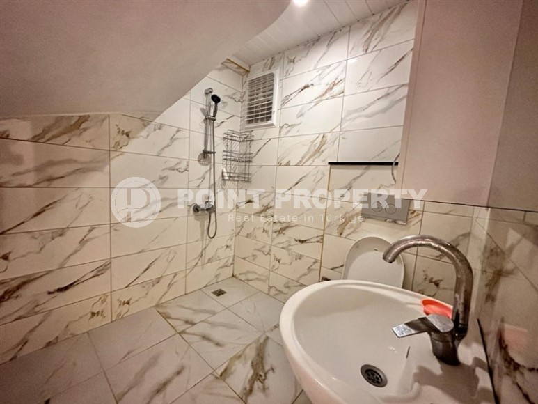 Large two-level apartment 5+1, on an area of 220 m2, in a residential complex built in 2017, in the center of Mahmutlar district-id-6644-photo-17