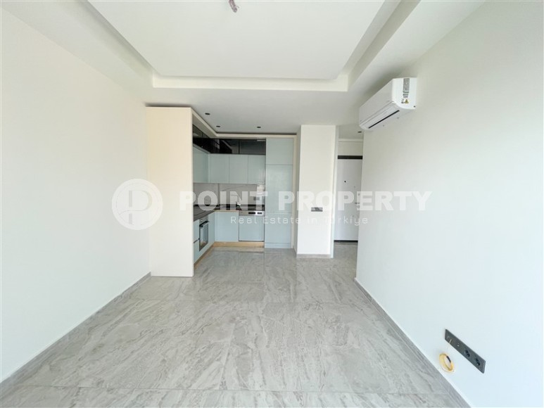 Compact 1+1 apartment, with high-quality finishing, household appliances and air conditioning, 650 meters from the luxurious sandy beach - Keykubat-id-6646-photo-2