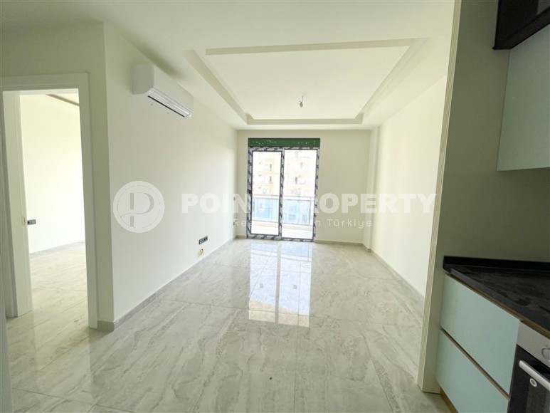 Compact 1+1 apartment, with high-quality finishing, household appliances and air conditioning, 650 meters from the luxurious sandy beach - Keykubat-id-6646-photo-3