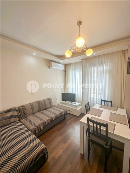 Inexpensive furnished apartment 1+1, on an area of 55 m2, in a building built in 2010, in the center of Mahmutlar district-id-6649-photo-2