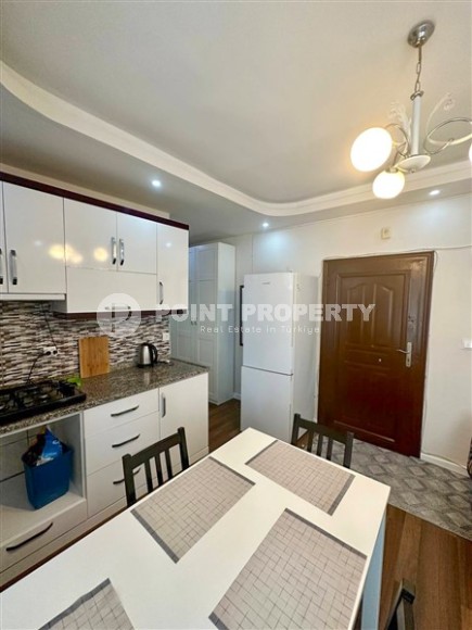 Inexpensive furnished apartment 1+1, on an area of 55 m2, in a building built in 2010, in the center of Mahmutlar district-id-6649-photo-3