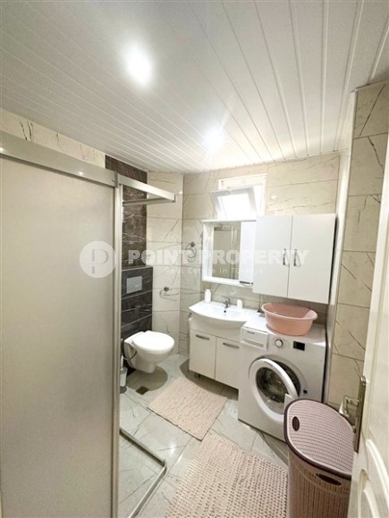 Inexpensive furnished apartment 1+1, on an area of 55 m2, in a building built in 2010, in the center of Mahmutlar district-id-6649-photo-7