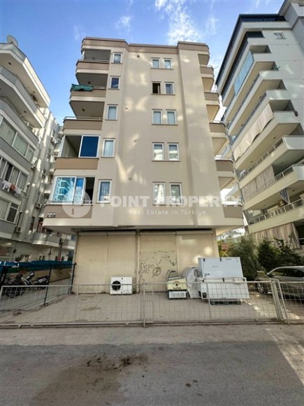 Inexpensive furnished apartment 1+1, on an area of 55 m2, in a building built in 2010, in the center of Mahmutlar district-id-6649-photo-12