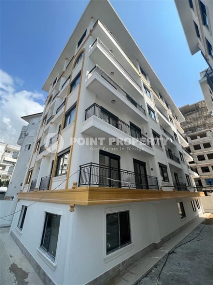 Новая квартира 1+1, на площади 55 м2, в жилом комплексе с богатой внутренней инфраструктурой, в центре Аланьи-id-6650-фото-2