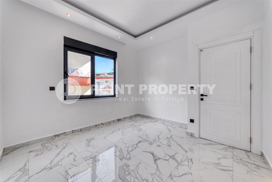 Стильная квартира с качественной чистовой отделкой, в 1300 метрах от моря, в центре Аланьи-id-6651-фото-6