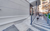 Стильная квартира с качественной чистовой отделкой, в 1300 метрах от моря, в центре Аланьи-id-6651-фото-14