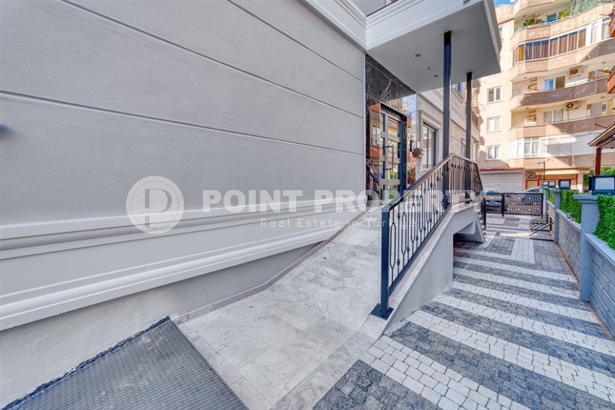 Стильная квартира с качественной чистовой отделкой, в 1300 метрах от моря, в центре Аланьи-id-6651-фото-14