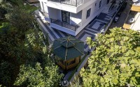 Стильная квартира с качественной чистовой отделкой, в 1300 метрах от моря, в центре Аланьи-id-6651-фото-16