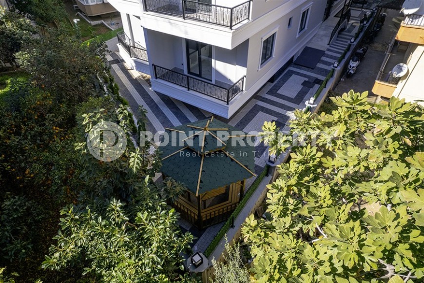 Стильная квартира с качественной чистовой отделкой, в 1300 метрах от моря, в центре Аланьи-id-6651-фото-16