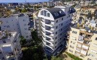 Стильная квартира с качественной чистовой отделкой, в 1300 метрах от моря, в центре Аланьи-id-6651-фото-18