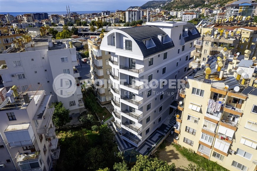 Стильная квартира с качественной чистовой отделкой, в 1300 метрах от моря, в центре Аланьи-id-6651-фото-18