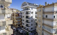 Стильная квартира с качественной чистовой отделкой, в 1300 метрах от моря, в центре Аланьи-id-6651-фото-19