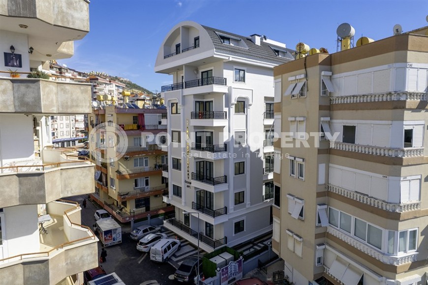 Стильная квартира с качественной чистовой отделкой, в 1300 метрах от моря, в центре Аланьи-id-6651-фото-19