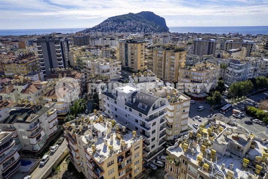 Стильная квартира с качественной чистовой отделкой, в 1300 метрах от моря, в центре Аланьи-id-6651-фото-20