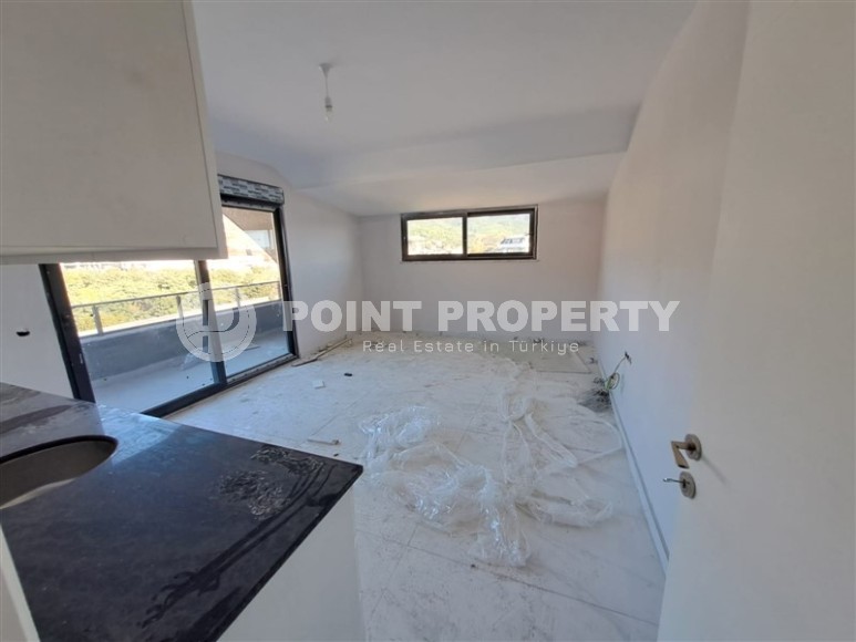 Apartment 2+1 and studio in a residential complex at the final stage of construction, two kilometers from the sea-id-6655-photo-3