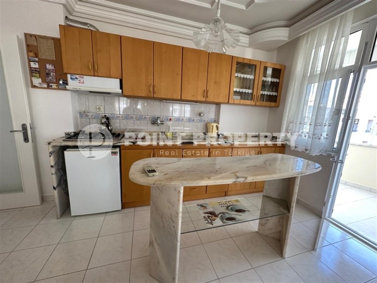 Comfortable apartment with furniture and household appliances, 650 meters from the sea, in the center of Mahmutlar-id-6663-photo-2