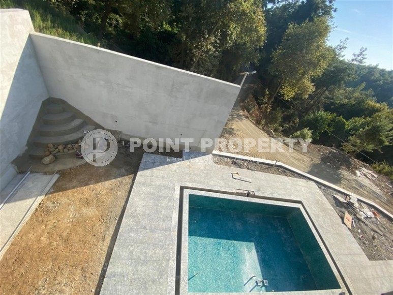 Две стильные новые виллы в живописной, экологически чистой местности, в элитном районе Аланьи - Бекташ-id-6664-фото-15