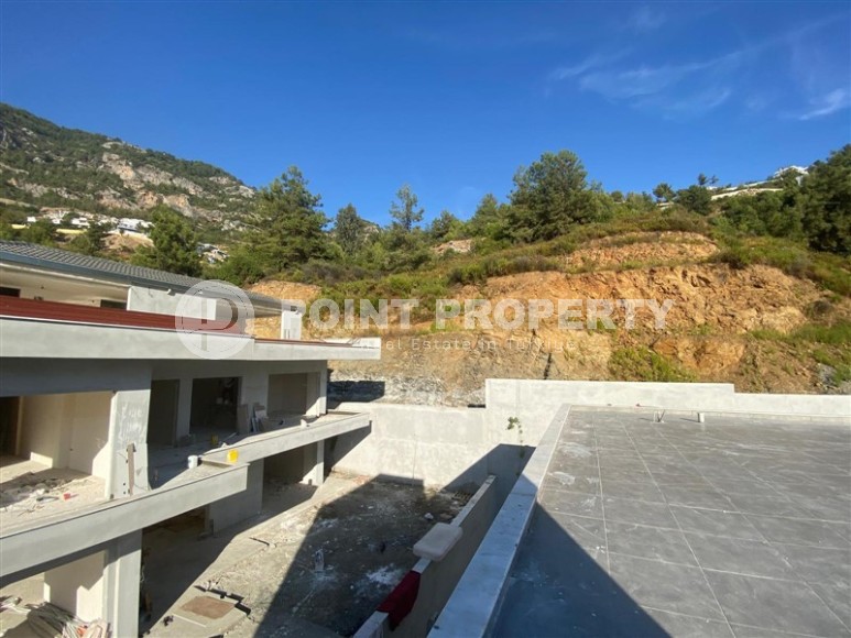 Две стильные новые виллы в живописной, экологически чистой местности, в элитном районе Аланьи - Бекташ-id-6664-фото-17