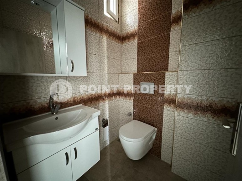 Advantageous offer - inexpensive, spacious apartment 150 meters from the sea, in the very center of Mahmutlar-id-6665-photo-10