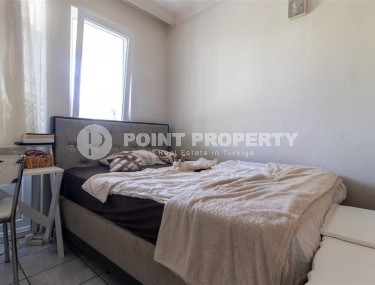 Affordable 2+1 apartment, on an area of 90 m2, in a building built in 1999, in the center of Mahmutlar district-id-6666-photo-4