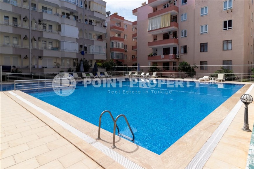 Affordable 2+1 apartment, on an area of 90 m2, in a building built in 1999, in the center of Mahmutlar district-id-6666-photo-11