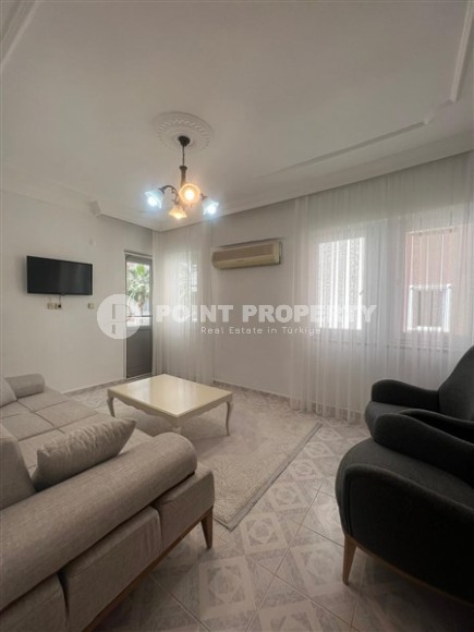 Comfortable apartment with furniture and household appliances, on the 2nd floor, in the center of the popular area of Alanya - Mahmutlar-id-6667-photo-2