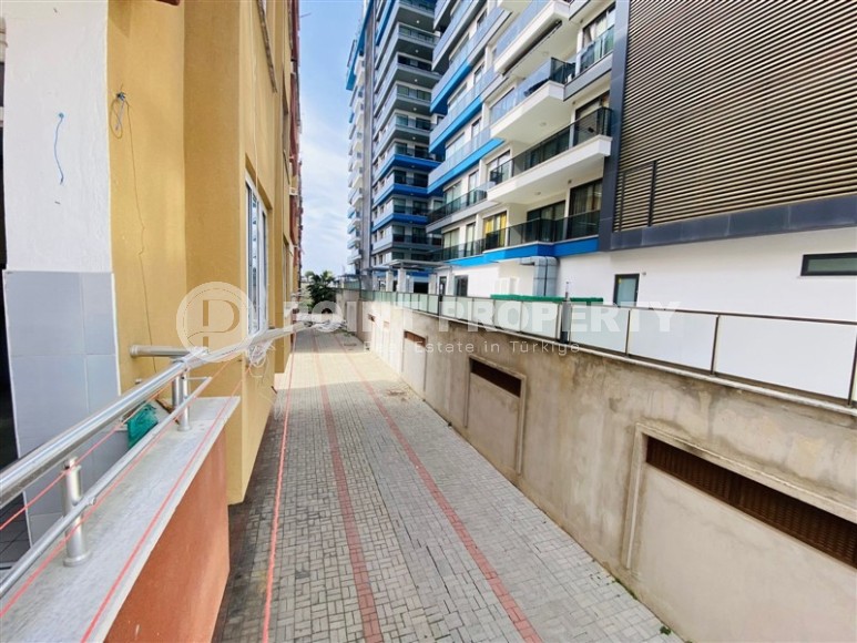 Apartment with an excellent location 100 meters from the beach, in the center of the modern area of Alanya - Mahmutlar-id-6668-photo-7