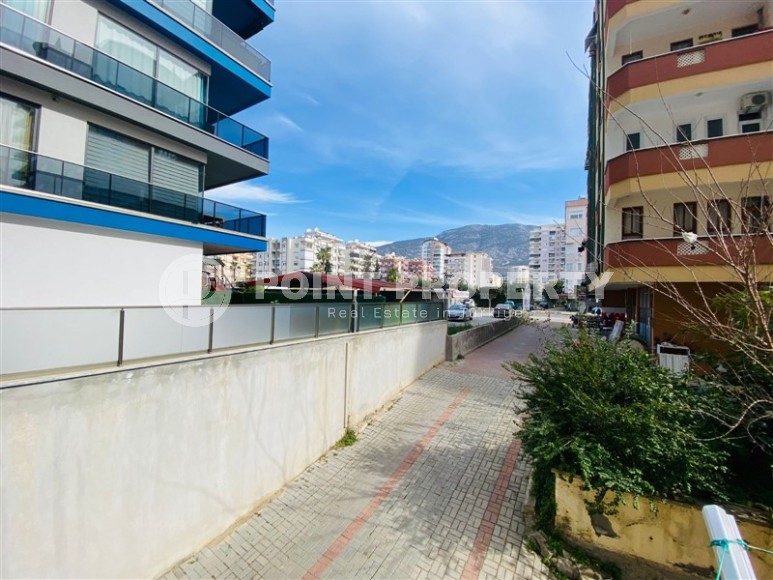 Apartment with an excellent location 100 meters from the beach, in the center of the modern area of Alanya - Mahmutlar-id-6668-photo-11
