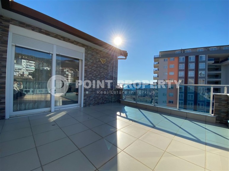 Большая двухуровневая квартира с панорамным видом на море и гору Кале, в спокойном районе Аланьи - Джикджилли-id-6672-фото-18