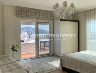 Panoramic duplex apartment overlooking the Taurus Mountains, 600 meters from the sea, in the center of the popular area of Alanya - Mahmutlar-id-6676-photo-4