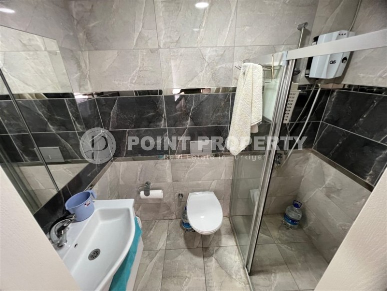 Affordable apartment with an excellent location 200 meters from the sea, in the center of Mahmutlar-id-6680-photo-9